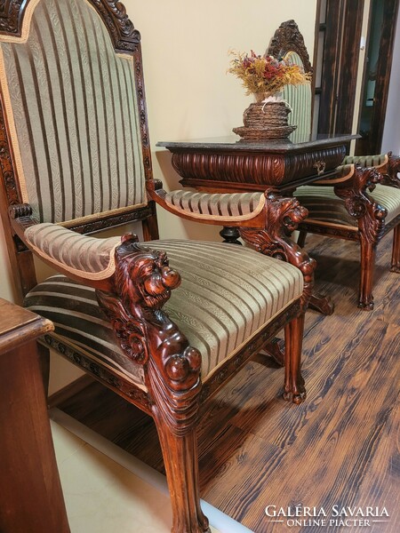 2 antique richly carved armchairs