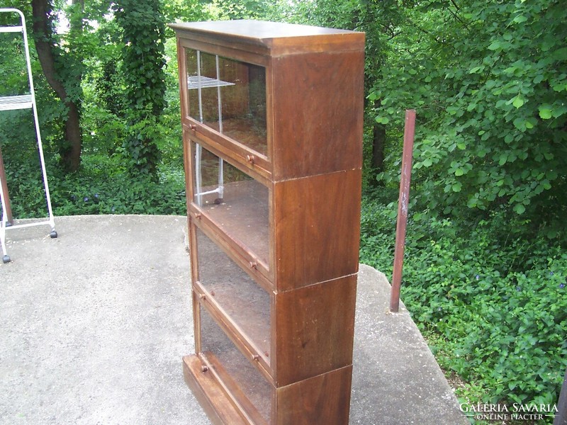 A small glass lingel type bookcase