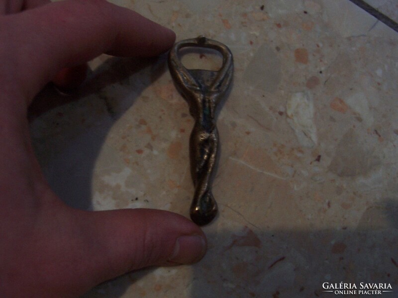 Women's nude copper bottle opener