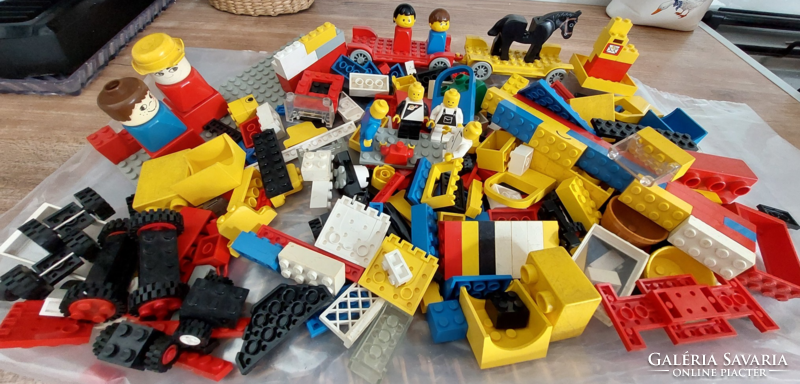 Lego all kinds of game elements, cubes, figures, car wheels, some with Duplo (1050 grams)