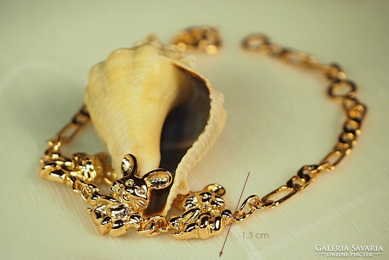 Gold filled bracelet depicting bunnies