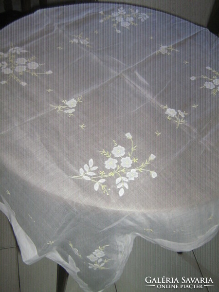 Beautiful vintage white sheer tablecloth with sewn on flowers