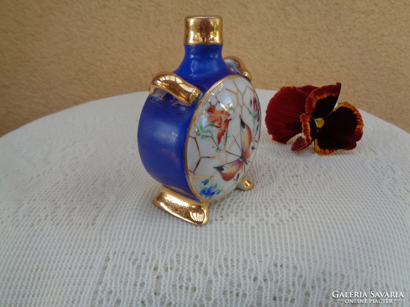 Zsolnay small jug, butterfly-flowered and hand-painted, thickly gilded, shield seal