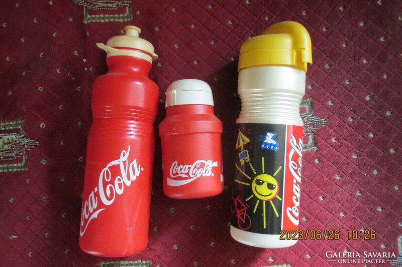 3 Coca-Cola bottles