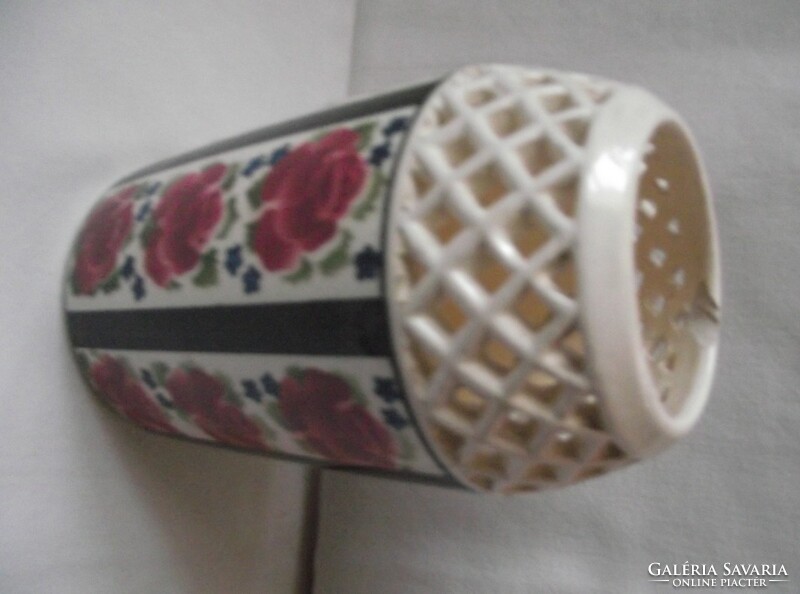Openwork vase with a rose pattern
