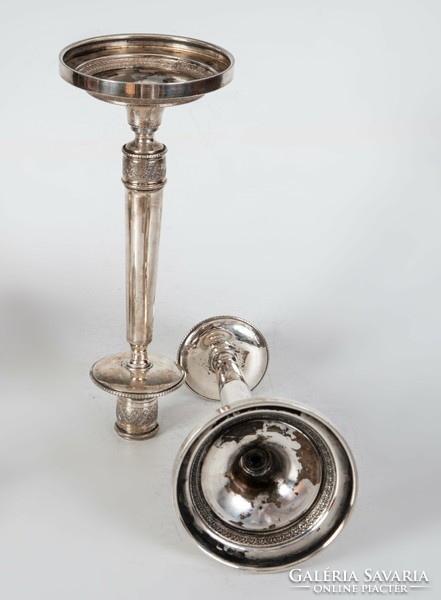 Silver candlestick in pairs