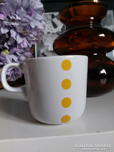 Ikea mug with yellow dots on small legs