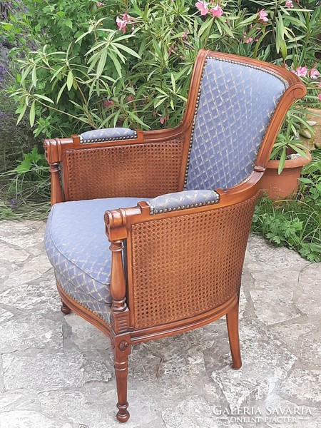 xvi. A rare double reeded elegant armchair in Louis style