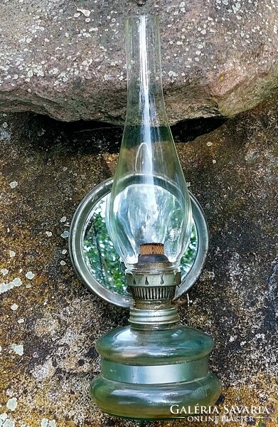 Kerosene lamp with mirror.