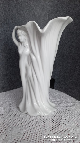 Vintage flower funnel-shaped porcelain vase, on the side a female nude with half a body melted into the vase, flawless