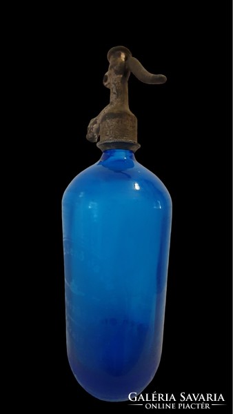 1931, blue soda bottle, with sandblasted inscription and pattern. Antique pewter head.