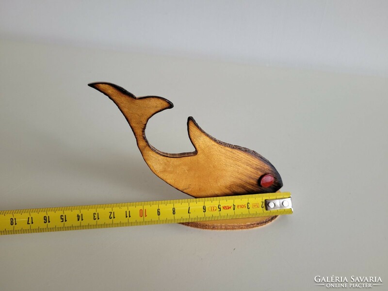 An old souvenir from Balaton made of wooden fish with the inscription Boglárlelle