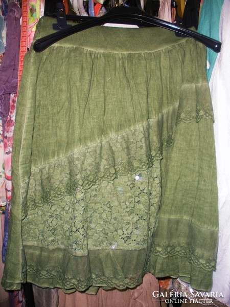 Fluffy, airy green skirt with lace inserts, Italy