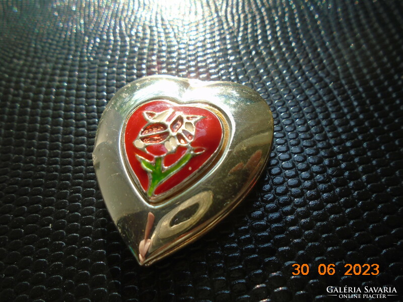 Silver-plated relic holding heart pendant with fire enamel flower