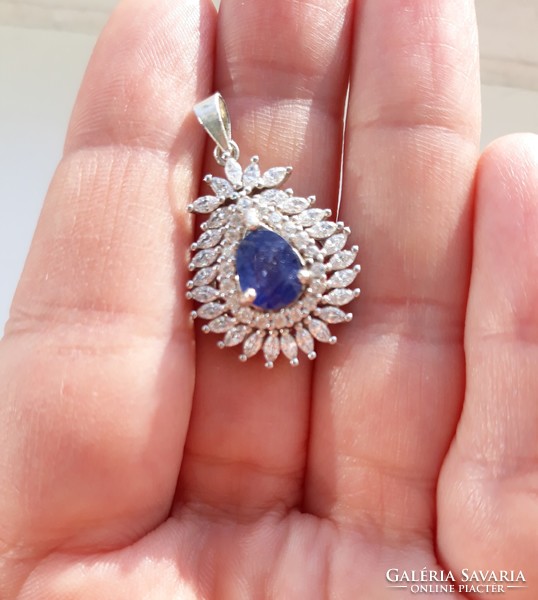 Drop-shaped silver pendant with sapphire and topaz stones