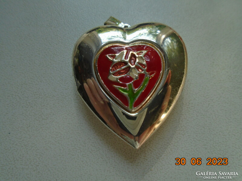 Silver-plated relic holding heart pendant with fire enamel flower