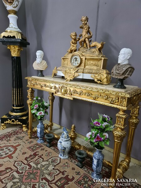 Gilded console table with beige marble top