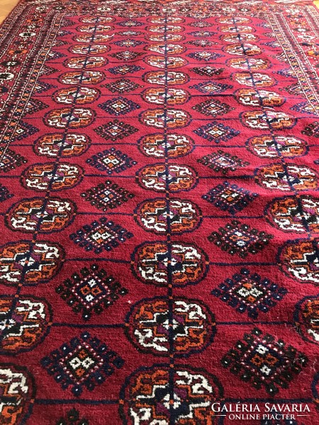 Tekke, kézi csomózású, gyapjú perzsa szőnyeg, 208x127 cm, szép állapotú, de egyik végén kissé sérült
