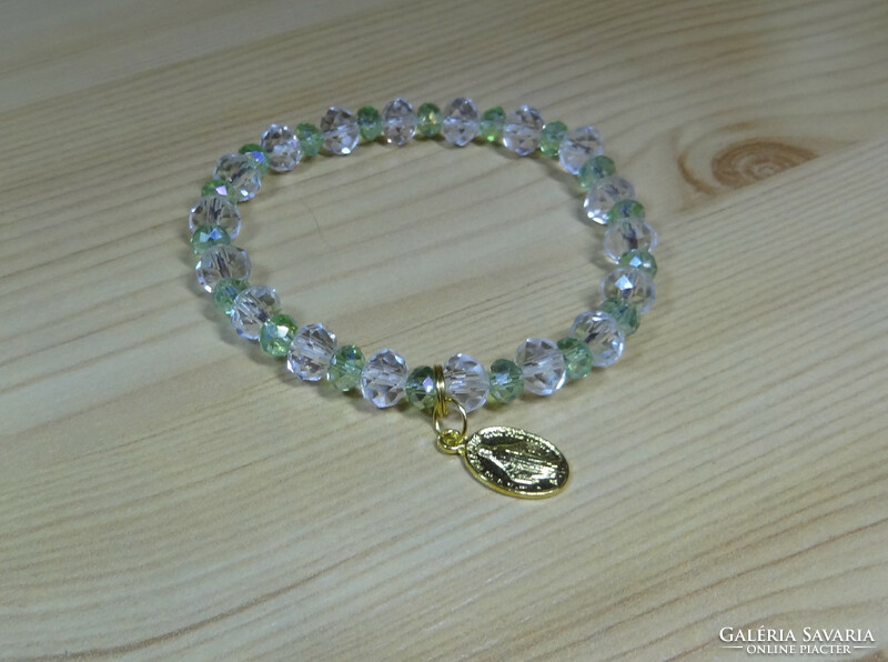 Bracelet made of crystal pearls, with Mary amulet.