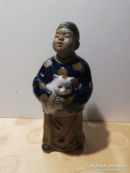 Large Chinese ceramic boy with a cat