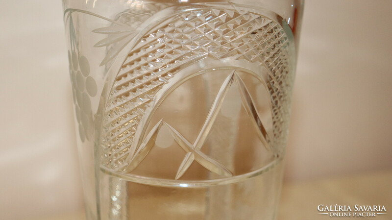 Brushed glass bottle with grape pattern