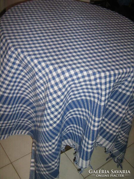 Beautiful vintage white and blue checkered tablecloth with fringed edges