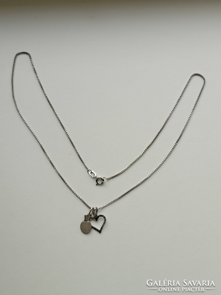 Silver necklace with silver ping pong racket and heart pendant!