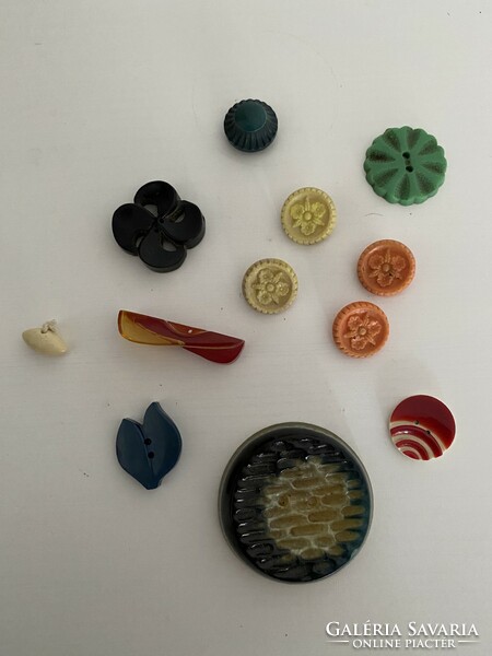A very interesting collection of mostly flower-shaped buttons
