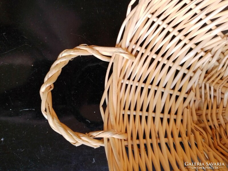 Old hand-woven cane fruit and bread storage basket with ears