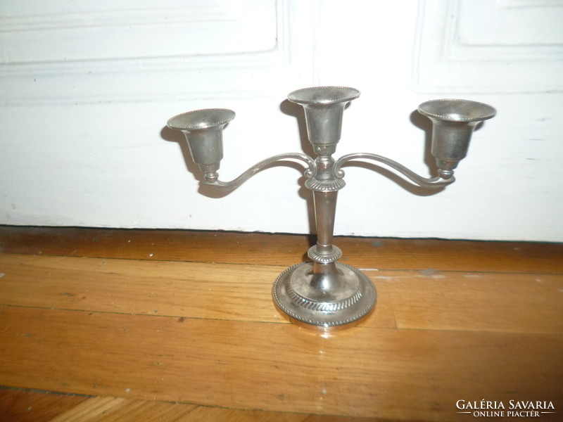 Old metal 3-prong candle holder