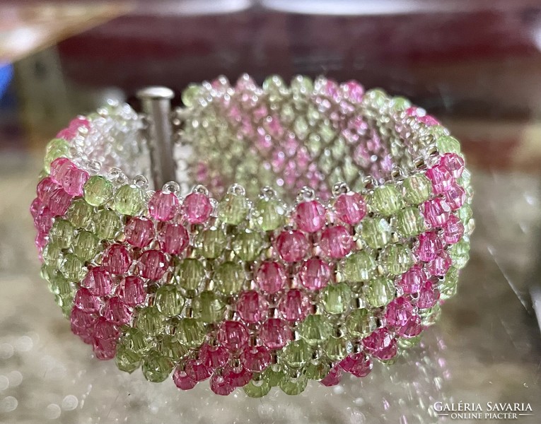 Extravagant wide women's capricho bracelet strung with polished green and pink beads