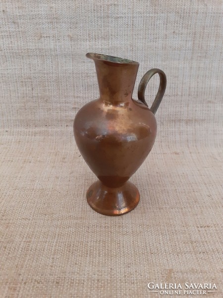 Retro copper vase in the shape of a small jug