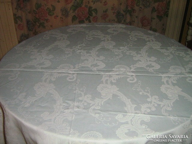 Beautiful damask tablecloth with a light blue and white pattern
