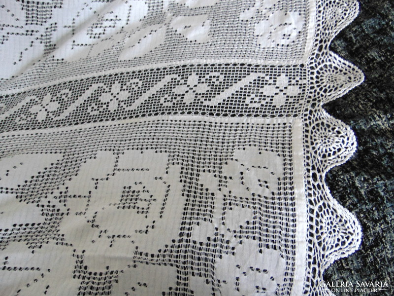 Antique hand-woven Transylvanian tablecloth with a rose pattern