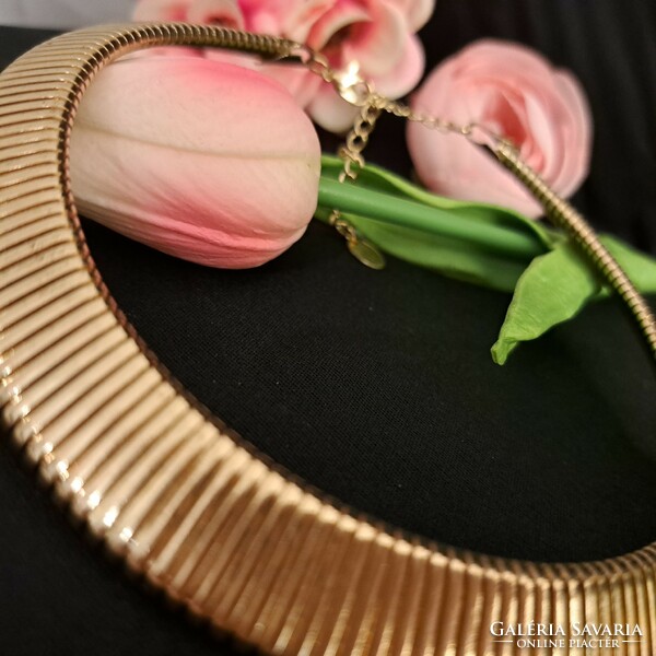 Gold-plated metal necklaces.