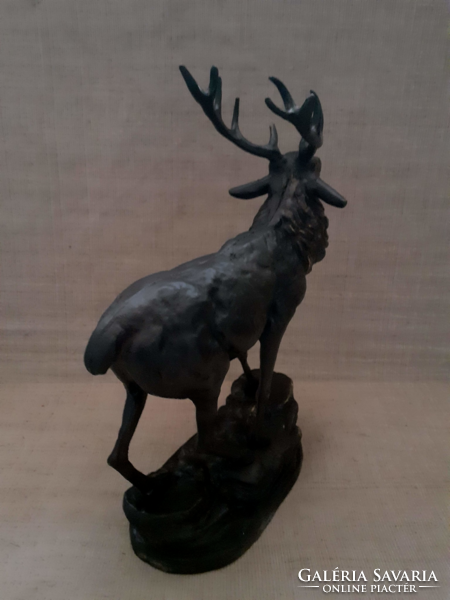 Old cast iron deer statue