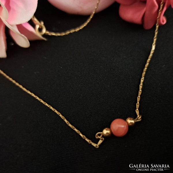 Coral stone gold-plated necklaces.