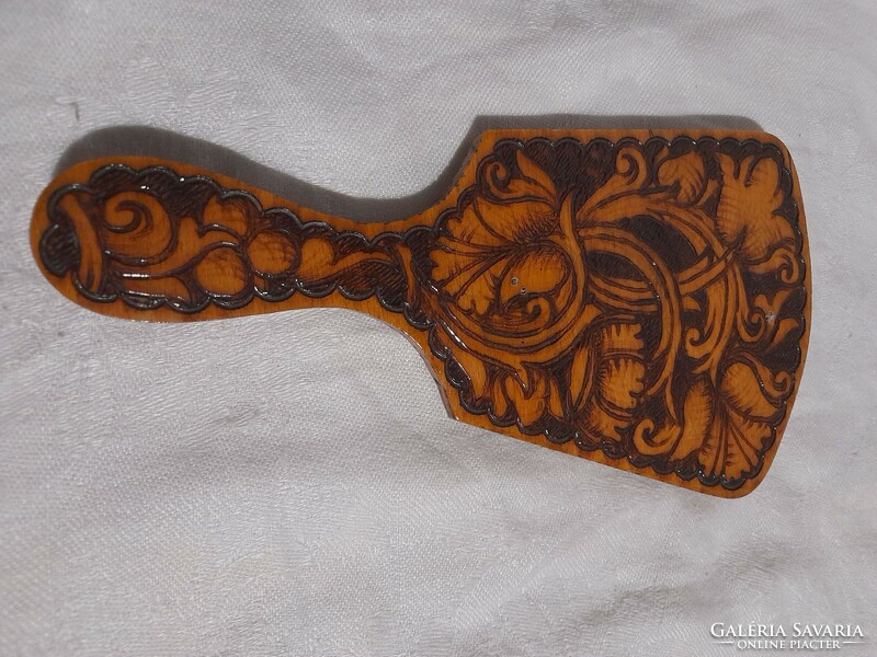Carved hand mirror