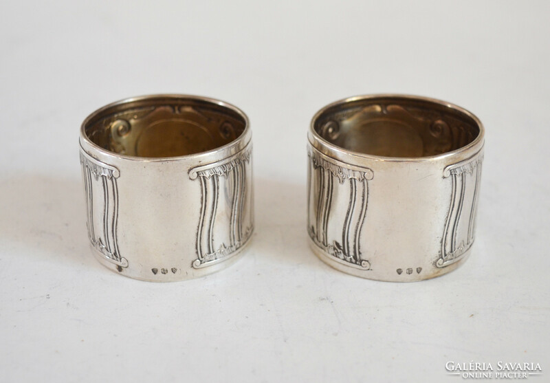Silver napkin ring pair wheel shape. In art deco style, with a gold disc, monogrammed 