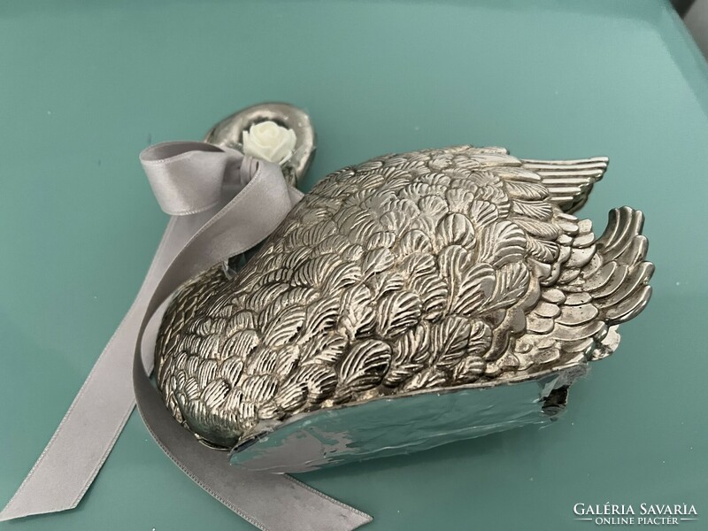 A wonderful silver napkin holder swan