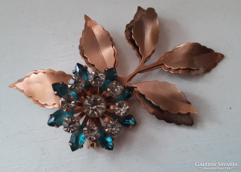 Custom-made gold-plated brooch pin studded with polished stones