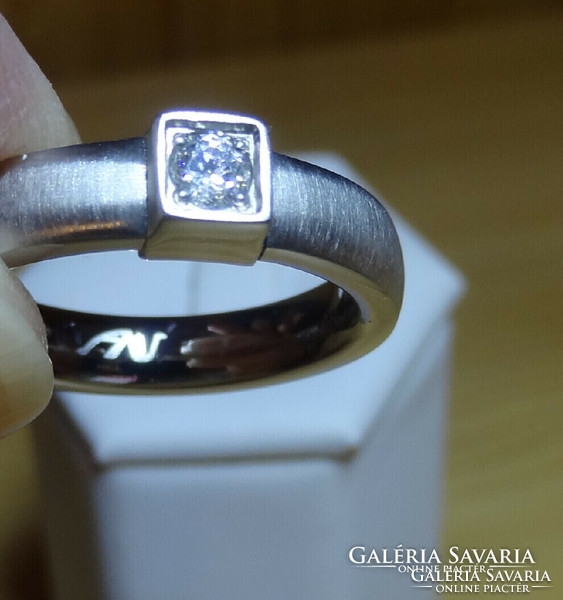 Top brand medical metal ring with synthetic diamond.