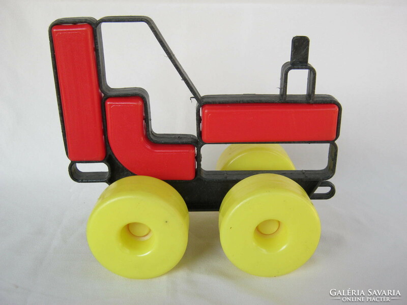 Retro plastic pulling toy tractor