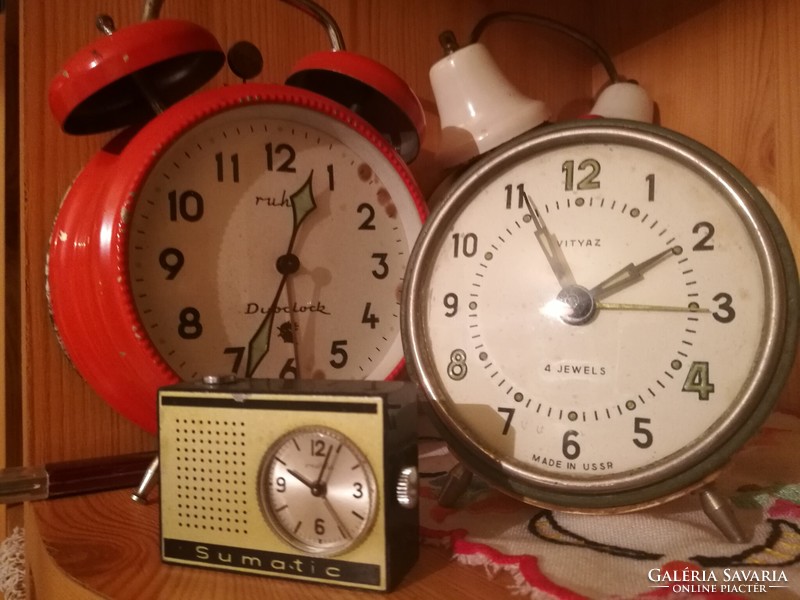 8 old rattle clocks for sale together