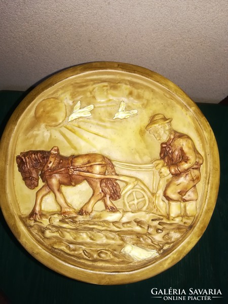 Handmade ceramic relief wall plate, 21 cm in diameter