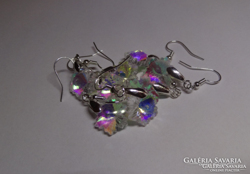 Crystal snowflake-shaped hook-on earrings.