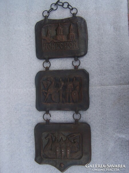 Three-part Russian wall plaque consisting of three connected parts depicting historical scenes