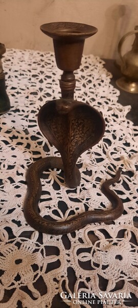 Antique cobra candle holder