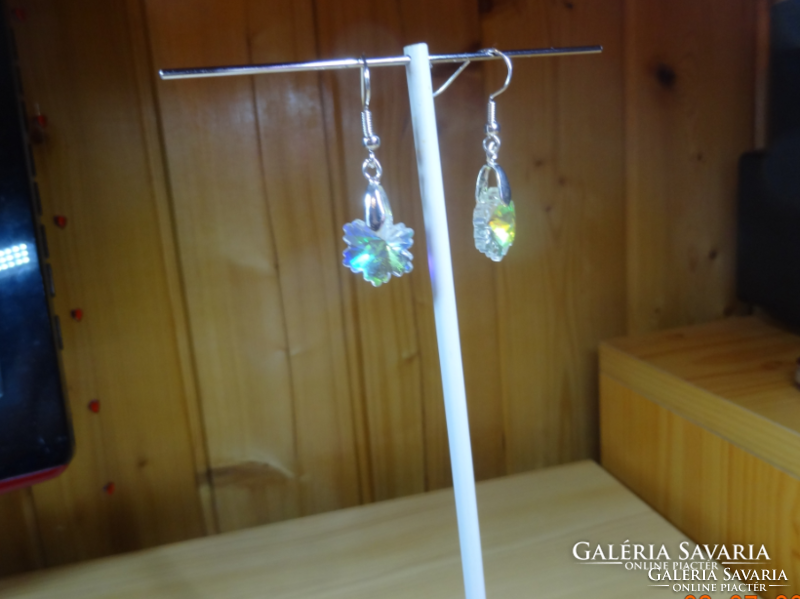 Crystal snowflake-shaped hook-on earrings.