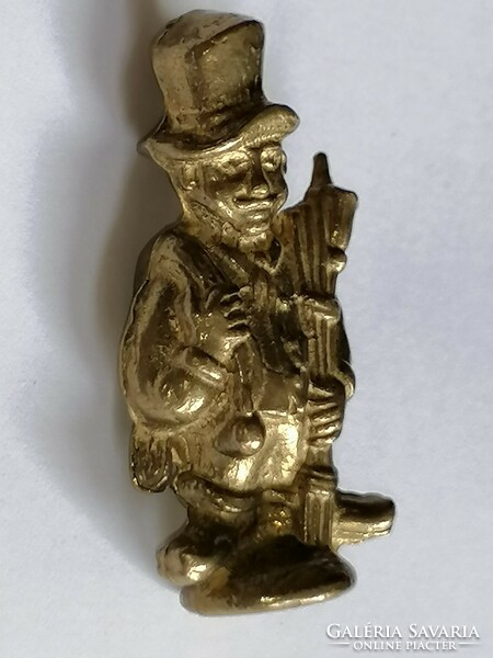 Copper, figure with a lucky hat, perhaps a chimney sweep 48.